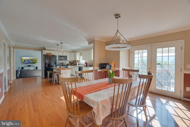 2417 Buck Hill Rd, Gerrardstown, WV 25420 - dining area with crown molding, baseboards, french doors, and light wood finished floors