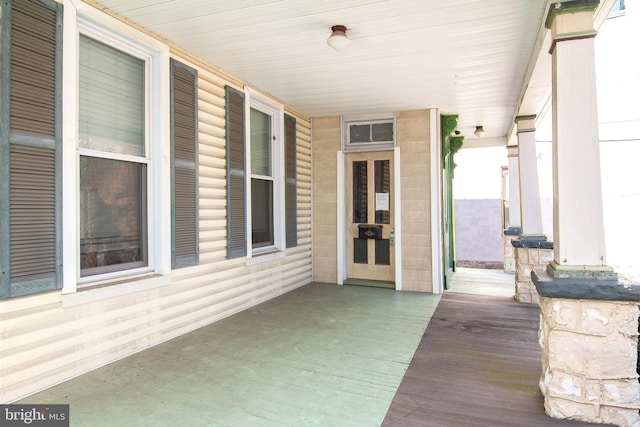 wooden deck with covered porch