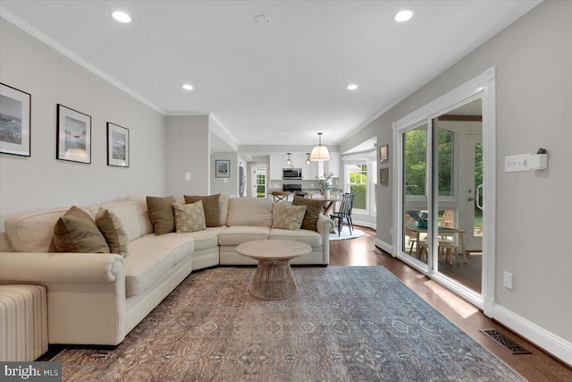 12649 Thunder Chase Dr, Reston, VA 20191 - living area with dark wood-style floors, recessed lighting, baseboards, and crown molding