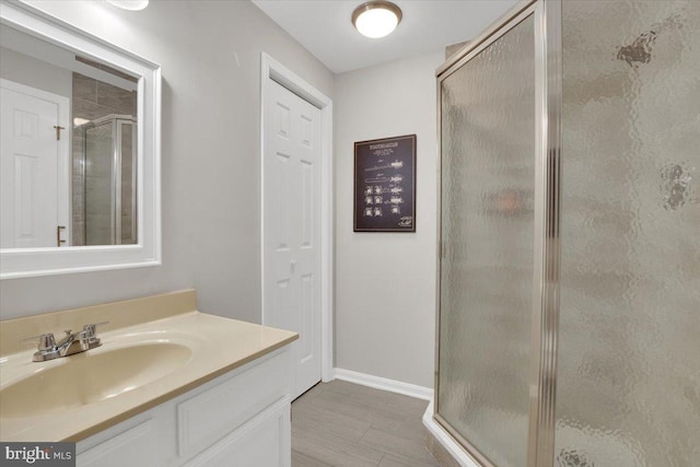12649 Thunder Chase Dr, Reston, VA 20191 - full bathroom with a shower stall, vanity, and baseboards