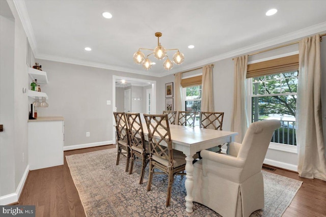 12649 Thunder Chase Dr, Reston, VA 20191 - dining space featuring a chandelier, wood finished floors, baseboards, crown molding, and recessed lighting