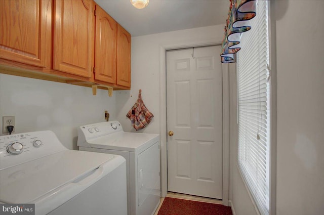 laundry room with cabinet space and independent washer and dryer