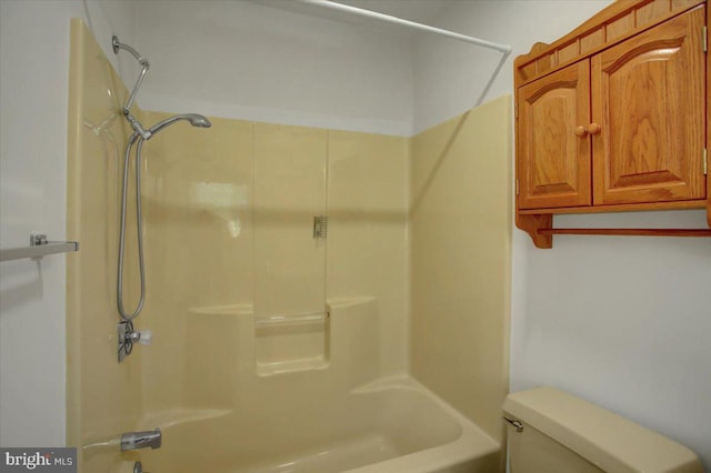 full bathroom featuring shower / tub combination and toilet