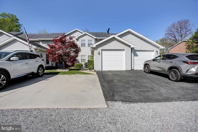 view of front facade with a garage and driveway