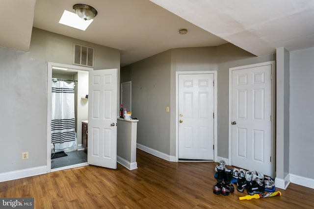 1815 Saint Paul St, Baltimore, MD 21202 - foyer featuring baseboards, wood finished floors, and visible vents