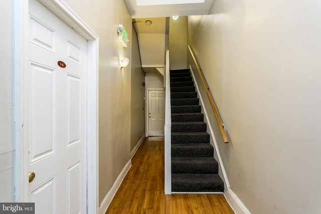 1815 Saint Paul St, Baltimore, MD 21202 - stairs featuring baseboards and wood finished floors