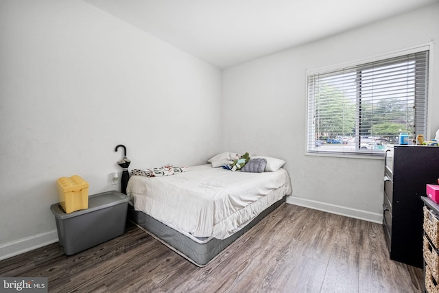 1423 Northgate Sq Unit 1423-11C, Reston, VA 20190 - bedroom featuring wood finished floors and baseboards