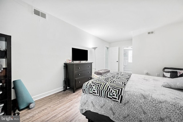1423 Northgate Sq Unit 1423-11C, Reston, VA 20190 - bedroom with wood finished floors and baseboards
