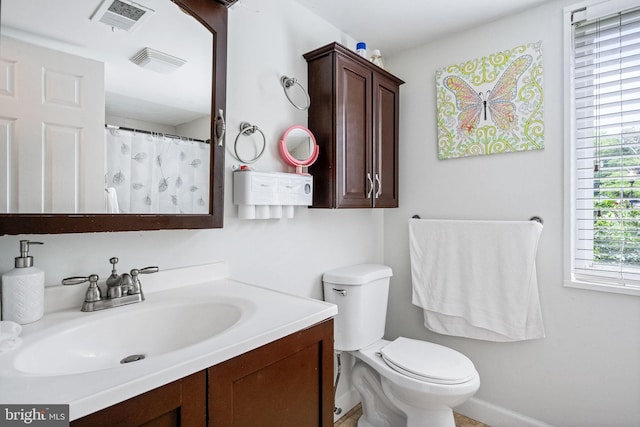 1423 Northgate Sq Unit 1423-11C, Reston, VA 20190 - bathroom with vanity, toilet, and baseboards