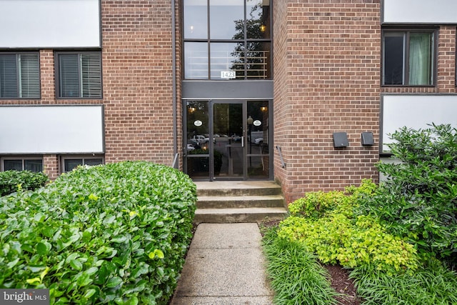 1423 Northgate Sq Unit 1423-11C, Reston, VA 20190 - doorway to property featuring brick siding