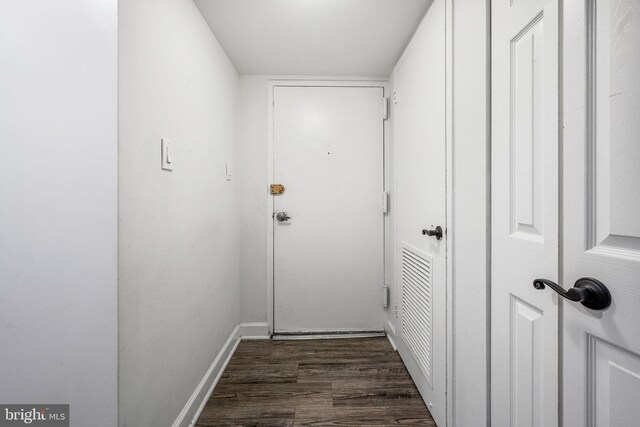 1423 Northgate Sq Unit 1423-11C, Reston, VA 20190 - hall featuring dark wood-style floors and baseboards