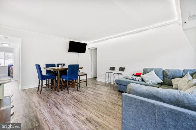 1423 Northgate Sq Unit 1423-11C, Reston, VA 20190 - living area with wood finished floors, crown molding, and baseboards