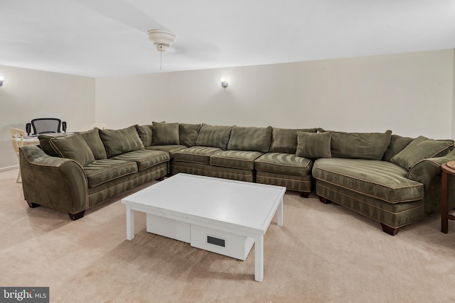 living room featuring light carpet