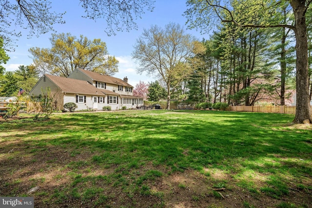 view of yard featuring fence