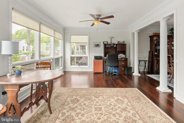 office featuring ornamental molding, a ceiling fan, decorative columns, and wood finished floors