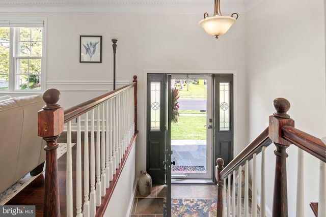 entrance foyer with crown molding