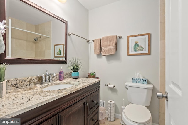 full bath with vanity, tile patterned flooring, a shower, toilet, and baseboards