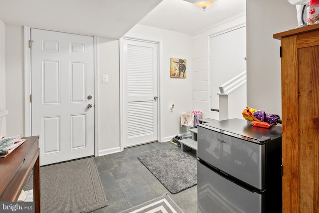 foyer with baseboards