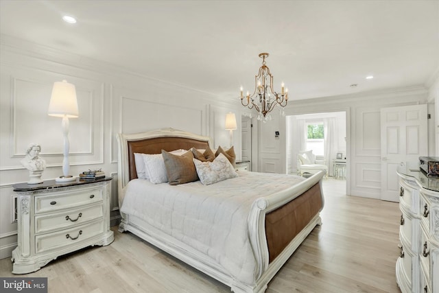 1071 Highland Rd, Newtown, PA 18940 - bedroom with a decorative wall, crown molding, a chandelier, light wood-style flooring, and recessed lighting