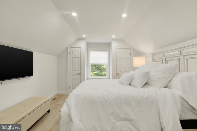 1071 Highland Rd, Newtown, PA 18940 - bedroom featuring light wood finished floors, baseboards, lofted ceiling, and recessed lighting
