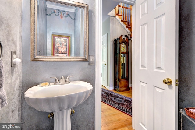 bathroom featuring wood finished floors