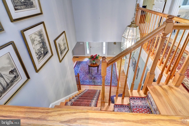 stairs featuring baseboards