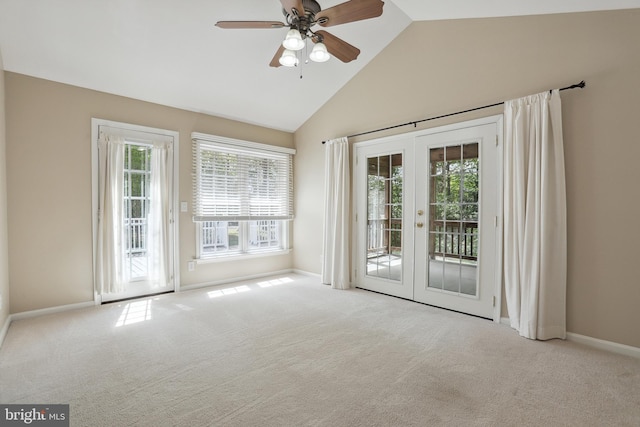 unfurnished room with baseboards, carpet, and french doors