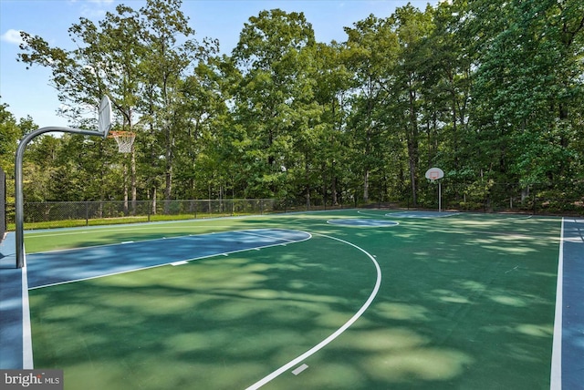 view of sport court with fence and community basketball court