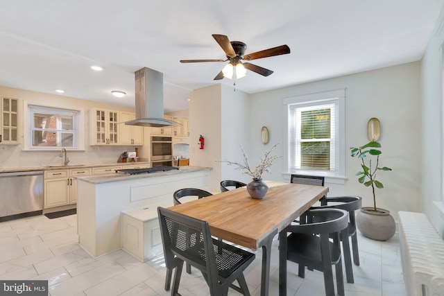 dining room with recessed lighting, ceiling fan, and marble finish floor