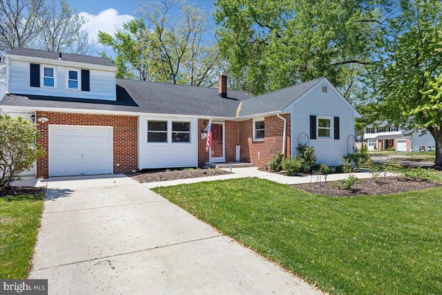 9 Biscayne Blvd, West Deptford, NJ 08096 - view of front of house featuring a chimney, concrete driveway, a front yard, and brick siding