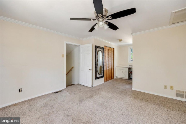 9 Biscayne Blvd, West Deptford, NJ 08096 - interior space featuring crown molding, carpet floors, visible vents, baseboards, and a ceiling fan