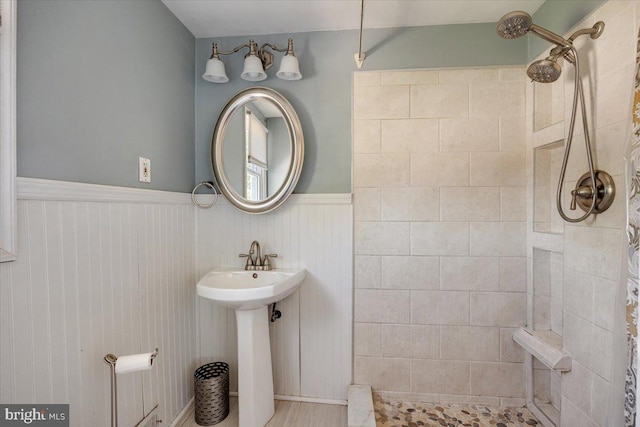 9 Biscayne Blvd, West Deptford, NJ 08096 - full bathroom featuring wainscoting, a tile shower, and a sink