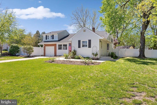 9 Biscayne Blvd, West Deptford, NJ 08096 - view of front facade with concrete driveway, an attached garage, fence, and a gate