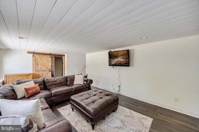 9 Biscayne Blvd, West Deptford, NJ 08096 - living area with baseboards, a barn door, and dark wood-style flooring