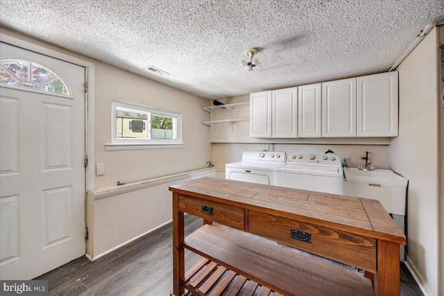 9 Biscayne Blvd, West Deptford, NJ 08096 - laundry area featuring cabinet space, a textured ceiling, a wainscoted wall, wood finished floors, and washer and clothes dryer