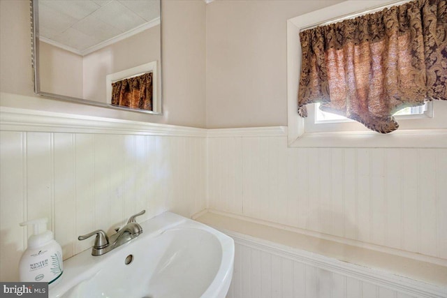 9 Biscayne Blvd, West Deptford, NJ 08096 - bathroom featuring a sink and a wainscoted wall