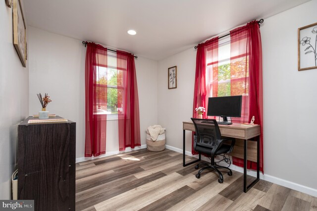 office area with recessed lighting, wood finished floors, and a wealth of natural light