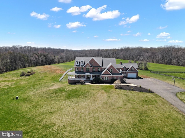 overview of rural landscape featuring a heavily wooded area