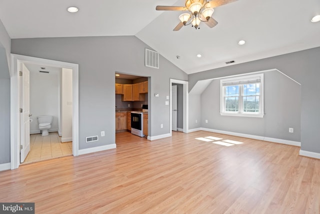 unfurnished living room featuring a ceiling fan, vaulted ceiling, light wood-type flooring, recessed lighting, and baseboards