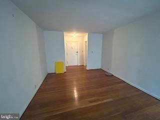 unfurnished room featuring wood finished floors