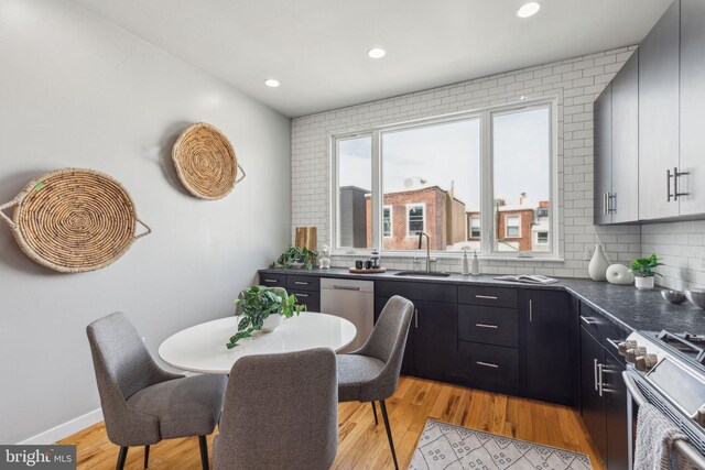 1211 Annin St, Philadelphia, PA 19147 - interior space with a sink, recessed lighting, dark countertops, and appliances with stainless steel finishes