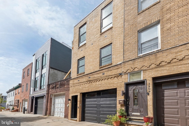 1211 Annin St, Philadelphia, PA 19147 - view of building exterior featuring a garage