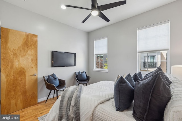 1211 Annin St, Philadelphia, PA 19147 - bedroom featuring light wood finished floors, multiple windows, baseboards, and a ceiling fan