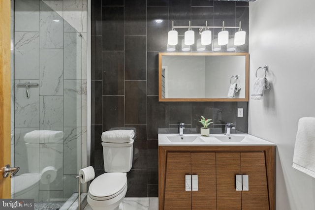 1211 Annin St, Philadelphia, PA 19147 - bathroom with double vanity, toilet, a stall shower, a sink, and tile walls