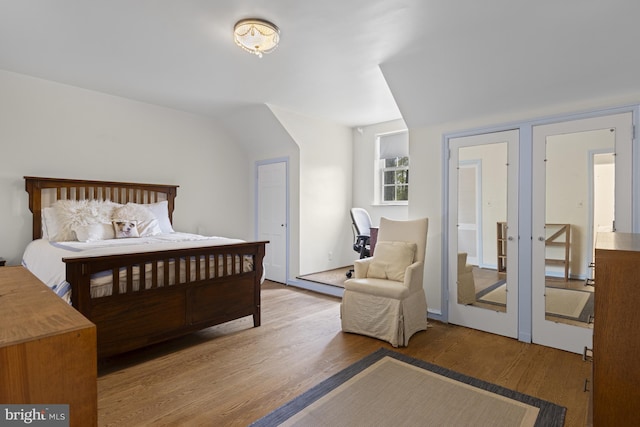 bedroom featuring wood finished floors