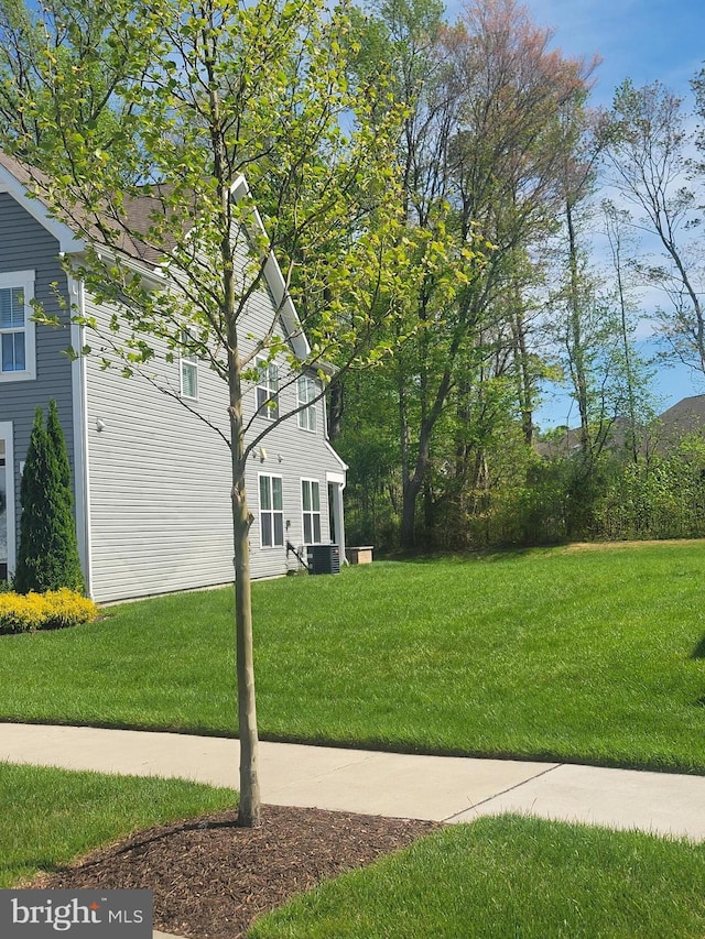 exterior space featuring central AC unit