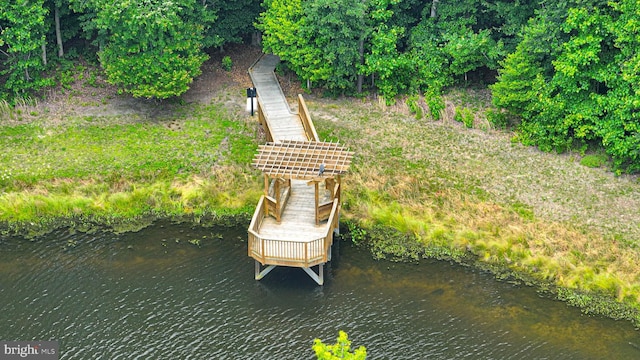 exterior space with a water view and stairway