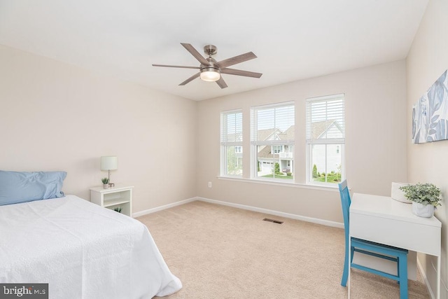 39348 Owls Nest Ln, Millville, DE 19967 - carpeted bedroom featuring baseboards, ceiling fan, and visible vents