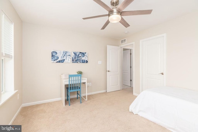 39348 Owls Nest Ln, Millville, DE 19967 - bedroom with baseboards, light carpet, a ceiling fan, and visible vents