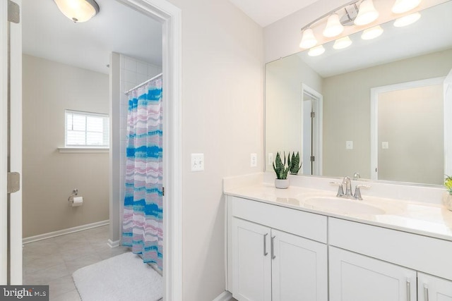 39348 Owls Nest Ln, Millville, DE 19967 - full bathroom featuring baseboards, curtained shower, tile patterned flooring, and vanity
